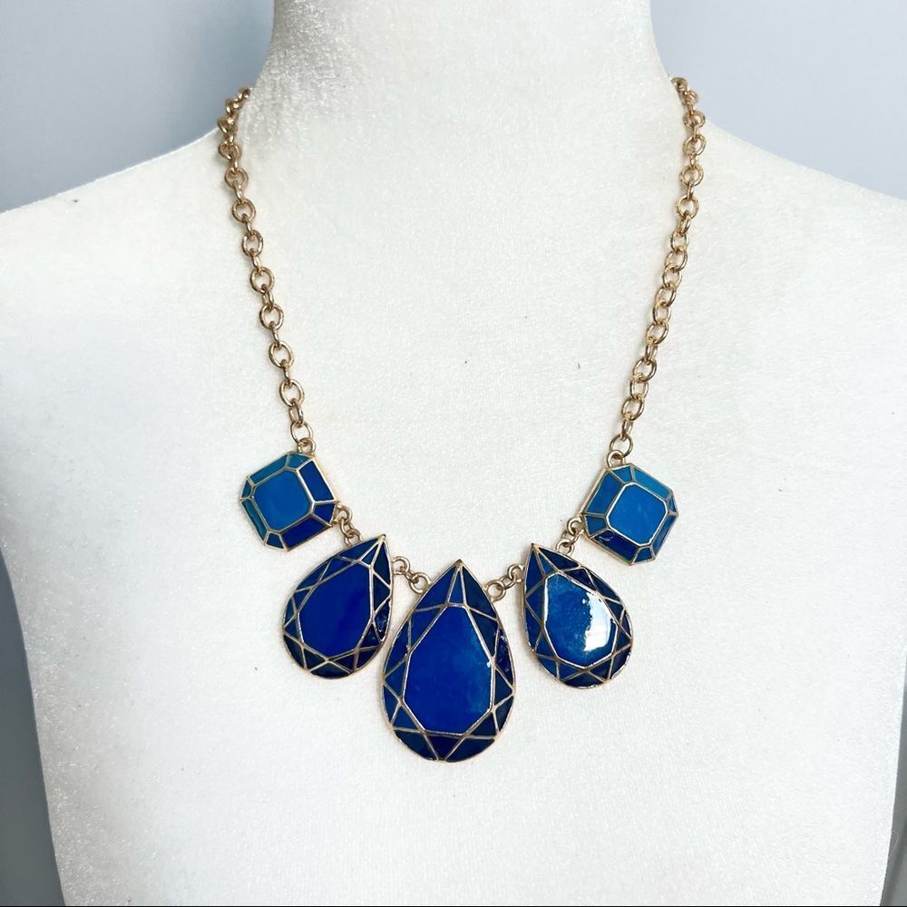 Faceted vibrant peacock blue and gold tone statement bib necklace